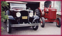 click for a larger picture of the 29 deSoto and the McCormick tractor